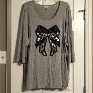 Shirt with sequin bow